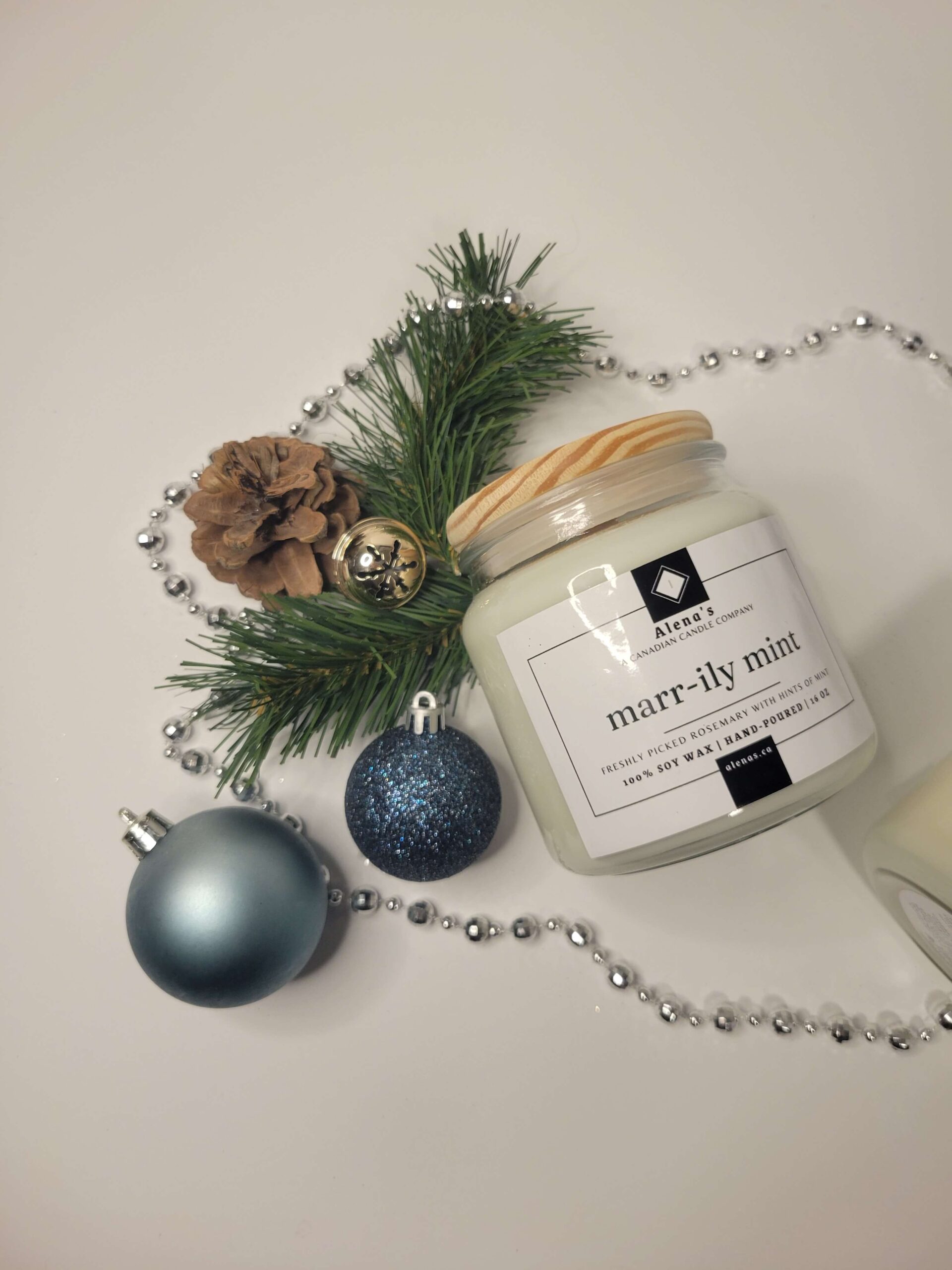 Marr-ily Mint 2 Mar-rily Mint 100% all natural soy wax candle by Alena’s — fresh rosemary and mint fragrance wrapped like a holiday gift.