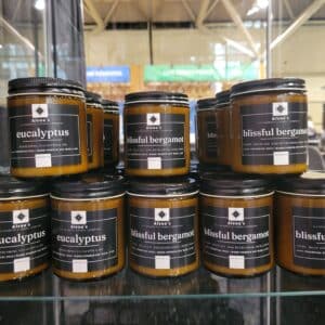 Alena’s Eucalyptus and Blissful Bergamot candle collection featuring hand-poured soy wax candles with a refreshing spa-inspired aroma and crackling wooden wick.