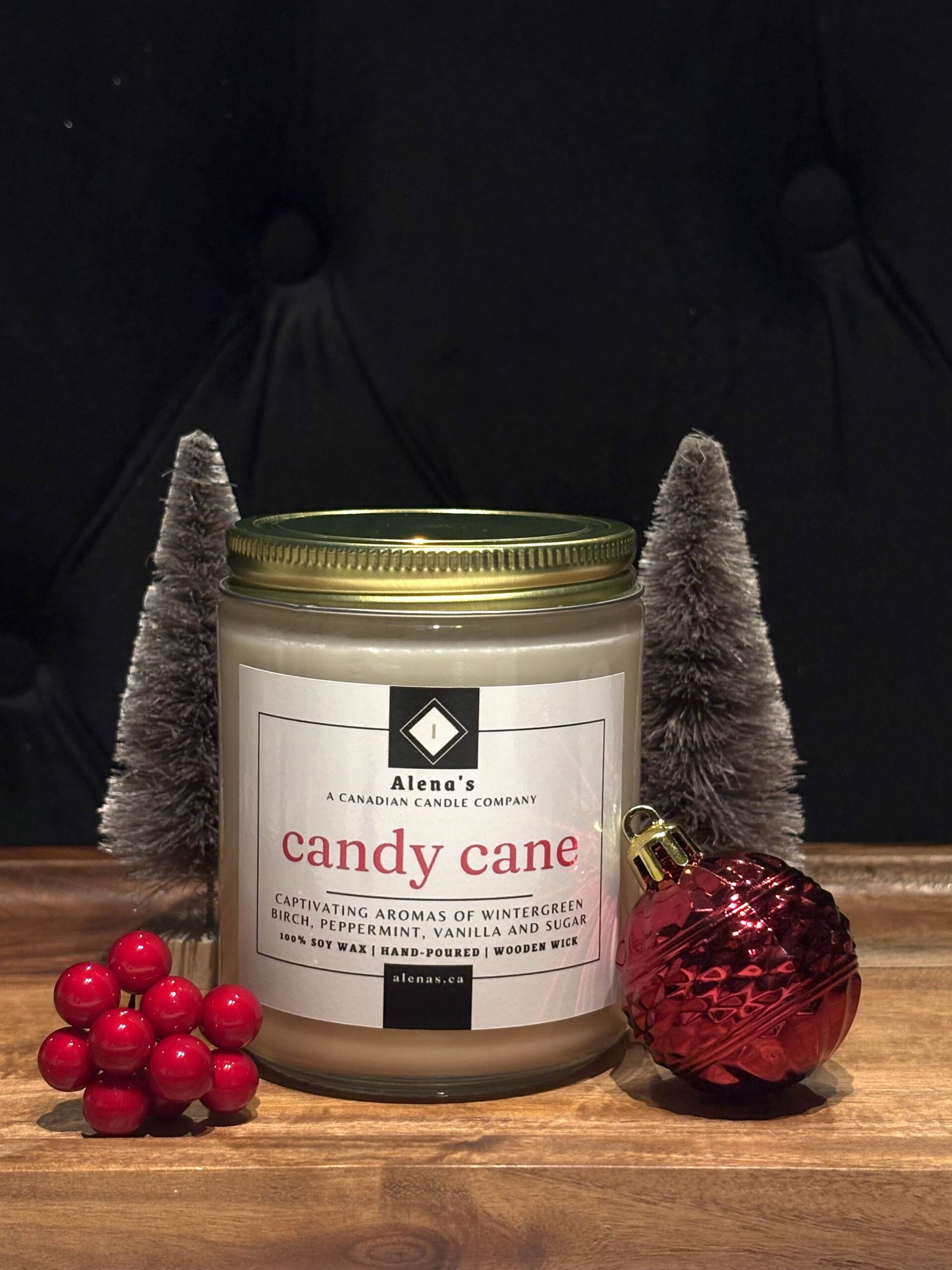 Candy Cane 2 Alena’s Candy Cane soy wax candle with peppermint and vanilla fragrance, hand-poured with a wooden wick in a holiday gold tin.