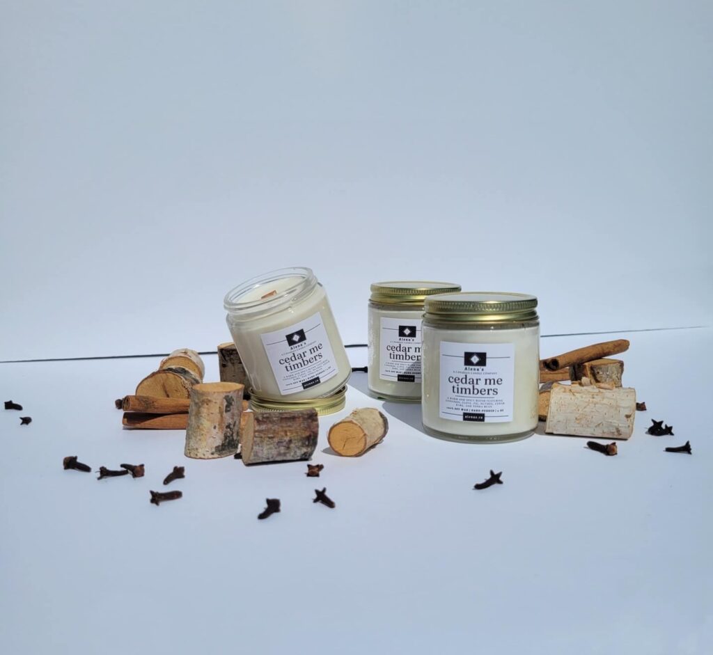 Today, we invite you to embark on a sensory expedition with Alena's 'Cedar Me Timbers' – Alena's handpoured & Canadian candle crafted to transport you to a rustic haven of warmth and coziness. Immerse yourself in this captivating blend that features the inviting notes of Cinnamon, Clove, Fig, Nutmeg, Cedar Bark, and the gentle touch of Tonka Bean.