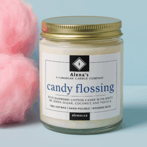 A Candy Flossing Candle with Cotton Candy in the back
