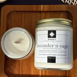 Hand-poured Lavender N Sage soy candles from Alena’s Gold Collection in 4 oz and 8 oz gold tins, featuring natural soy wax and a crackling wooden wick.