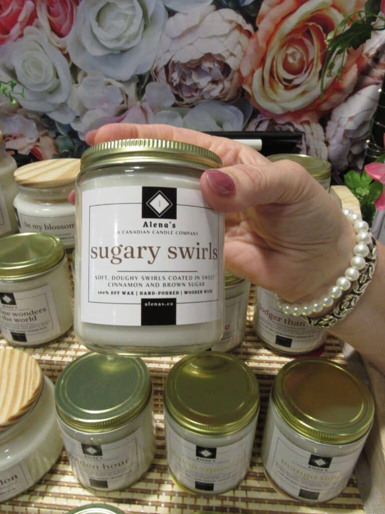 Sugary Swirls candle by Alena’s with notes of caramel, vanilla, and sweet sugar, hand-poured soy wax and wooden wick.