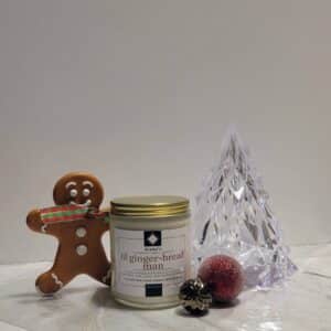 Grated Ginger with hints of Nutmeg, Cinnamon, and Clove, with notes of Vanilla ALena's lil Gingerbread man Soy wax wooden wick candle.