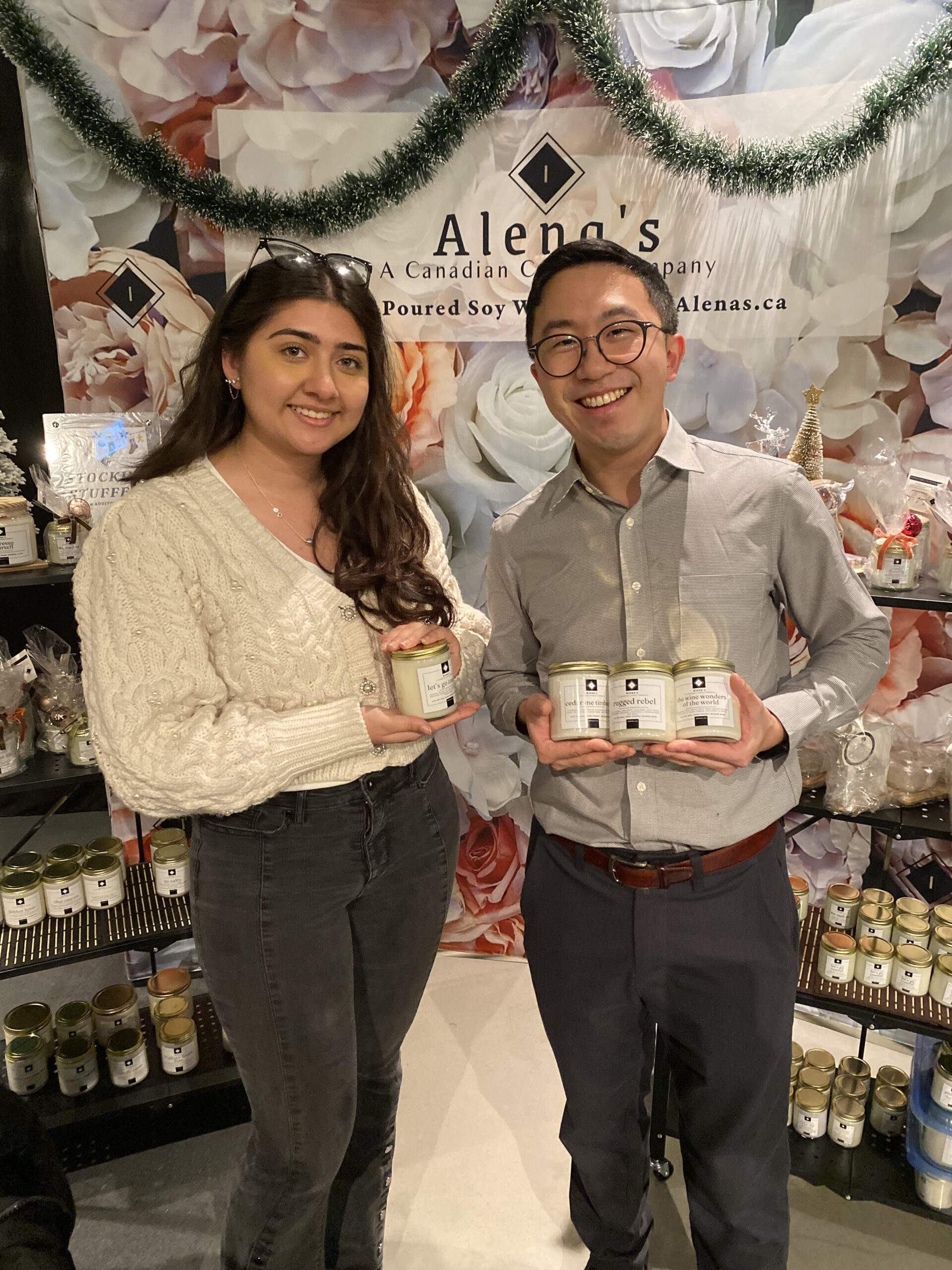 Customer Favourites — Start Here 26 ALena and Jermey holding his wining holiday scents